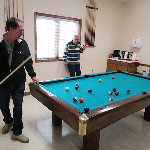 Men playing pool