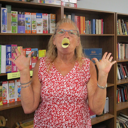 Woman with duck lips made of potato chips