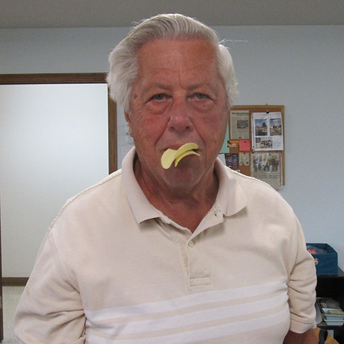 Man with duck lips made of potato chips