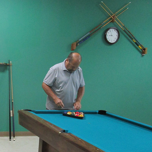 Man racking billard balls